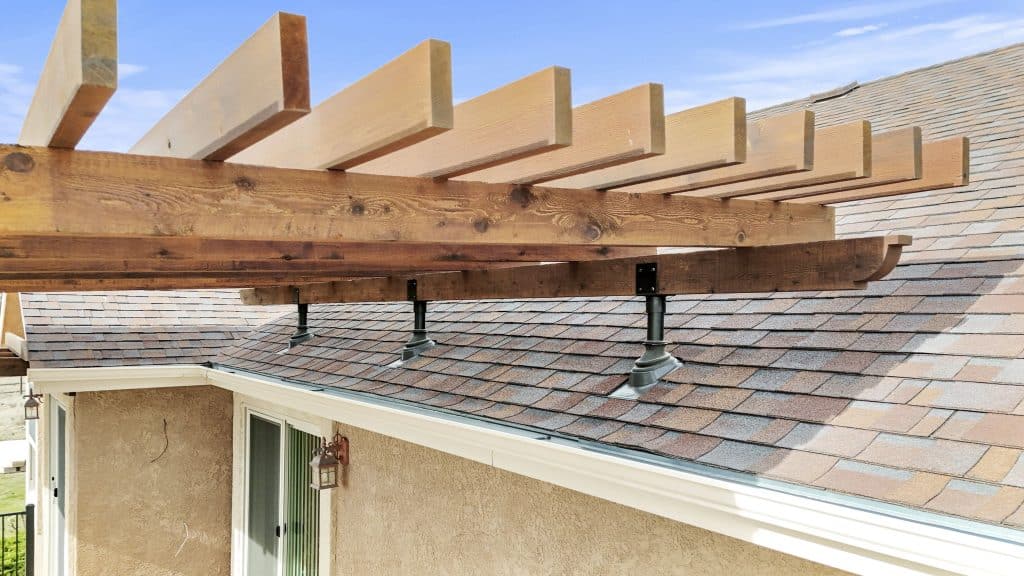 Outdoor Living deck builder shows Roof Supports in Black Forest