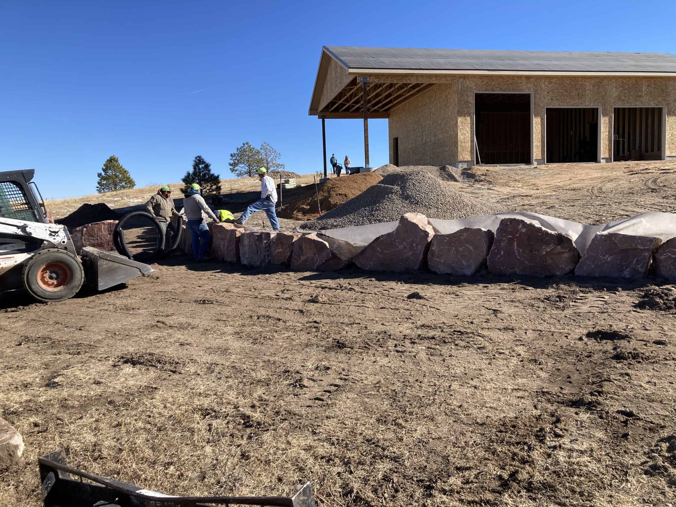 Retaining wall started for new garage addition