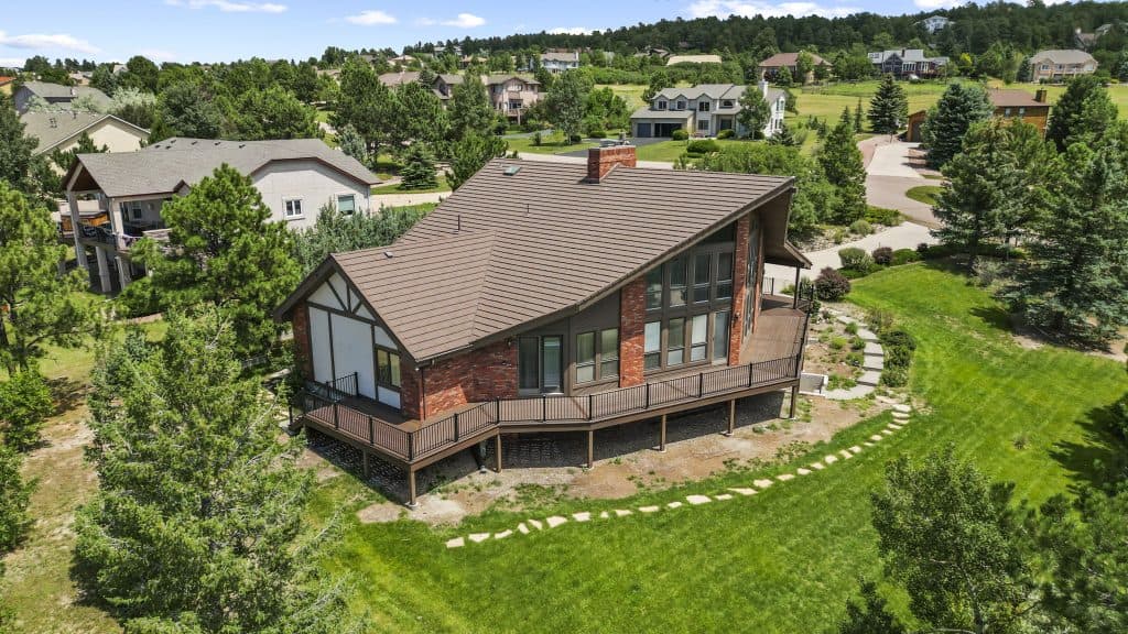 Custom Deck Builder from back facing front yard