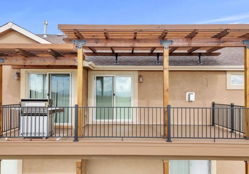 Deck Builder in Black Forest uses Rough Cedar for Pergola